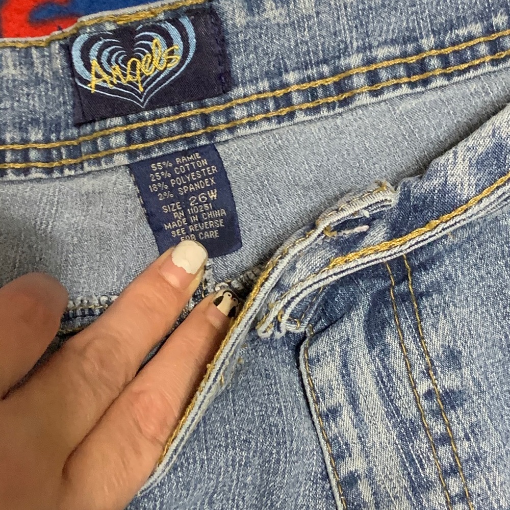 Angel size 26w beaded and embroidered jeans.